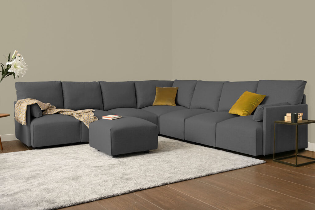 HB04-large-corner-sofa-footstool-3q-seal-4x4-lifestyle